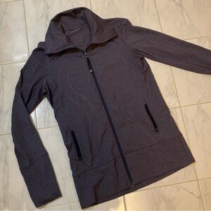 Lululemon navy blue zip up jacket.  Longer style. EUC! Zipper pockets